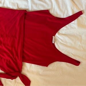 Red Reformation wrap dress . Size L . Worn once . Perfect condition .